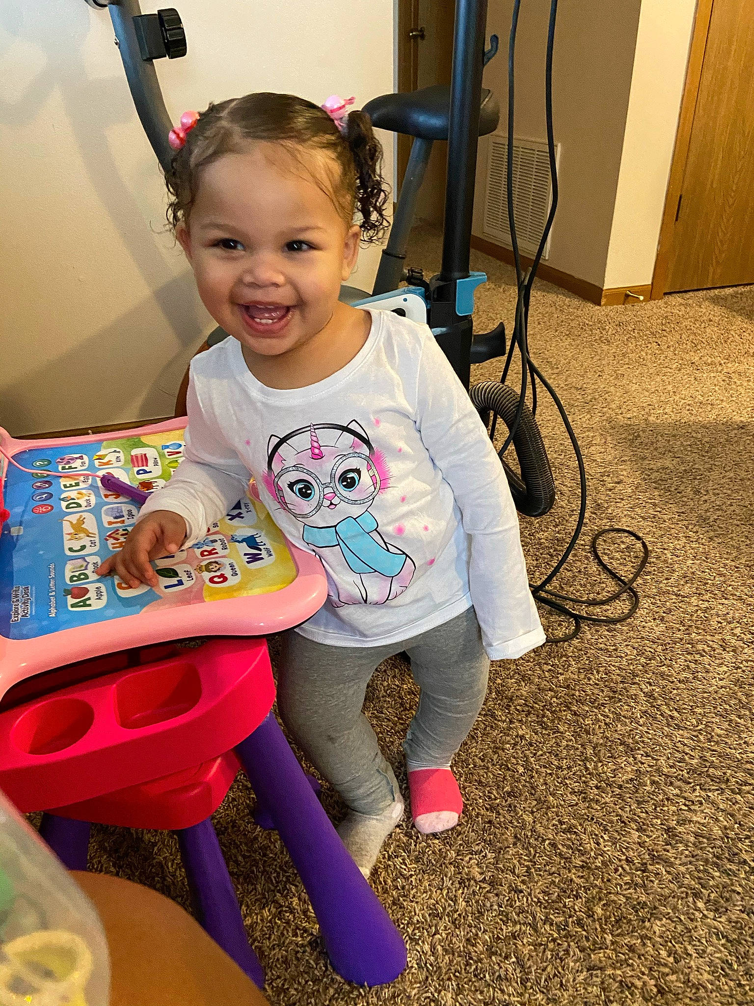 Amira joined the competition — help win amazing prizes! baby, baby_toddler_clothing, cable, child, eye, floor, hair_accessory, joy, mouth, person, pink, plastic, play, toddler