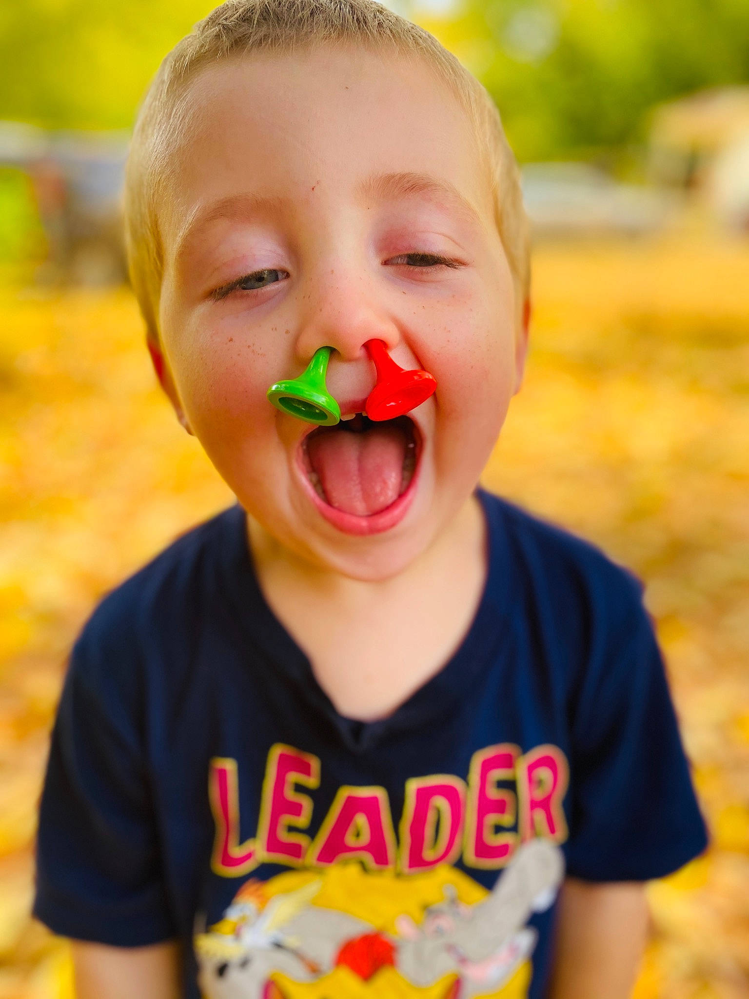 Jaxxson is registered to the contest to win money with this photo: baby, baby_toddler_clothing, cheek, child, face, fruit, grass, happy, head, lip, mouth, nose, orange, people_in_nature, person, skin, smile, summer, t_shirt, toddler