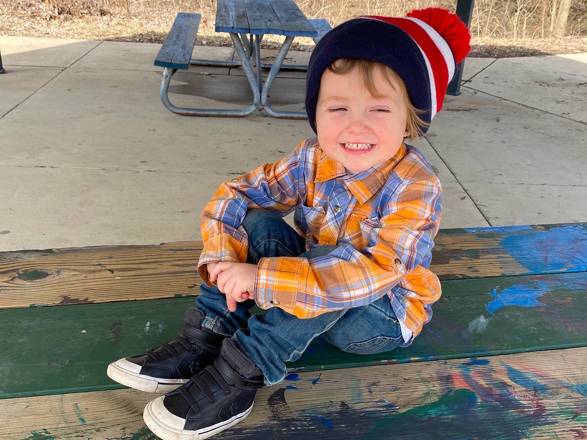 Jaxxson joined the competition — help win amazing prizes! asphalt, blue, child, electric_blue, fun, headwear, joy, leisure, pattern, person, personal_protective_equipment, play, public_space, recreation, road_surface, shoe, sitting, sleeve, smile, sneakers