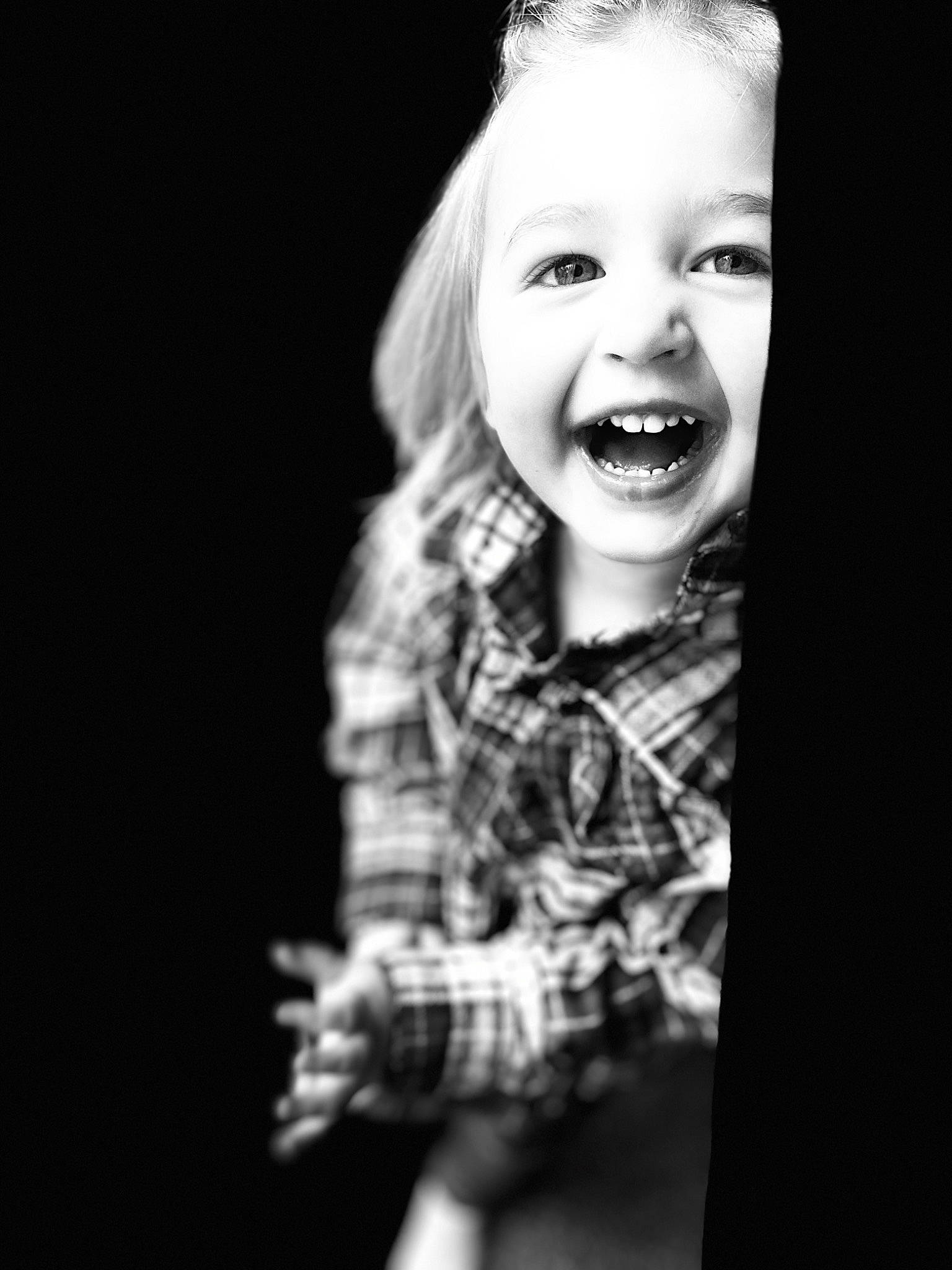 Alanna is registered to the contest to win money with this photo: arm, baby, beauty, cheek, entertainment, event, eye, eyelash, facial_expression, flash_photography, fun, gesture, hairstyle, happy, iris, monochrome, monochrome_photography, person, smile, style