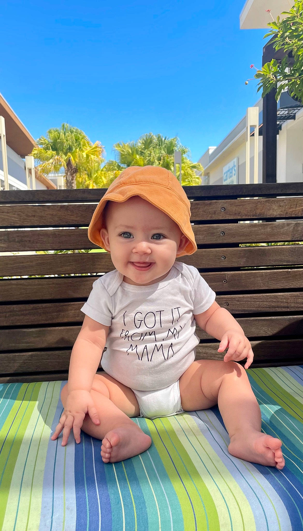 Octavia is registered to the contest to win money with this photo: baby_toddler_clothing, grass, green, happy, hat, headgear, headwear, joy, leaf, leisure, light, person, photograph, plant, product, skin, sky, smile, summer, sun_hat