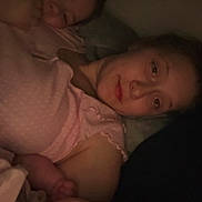 Lucifia is registered to the contest to win money with this photo: baby, bed, child, closeup, cozy, cuddle, dim_light, face, family, head, indoor, love, pajamas, portrait, rest, skin, sleeping, tender, warmth, woman