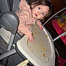 toddler, child, high_chair, indoor, messy, hoodie, blue_eyes, face, expression, furniture, toy, home, tray, snack, curious, person, hair, sitting, plastic, play