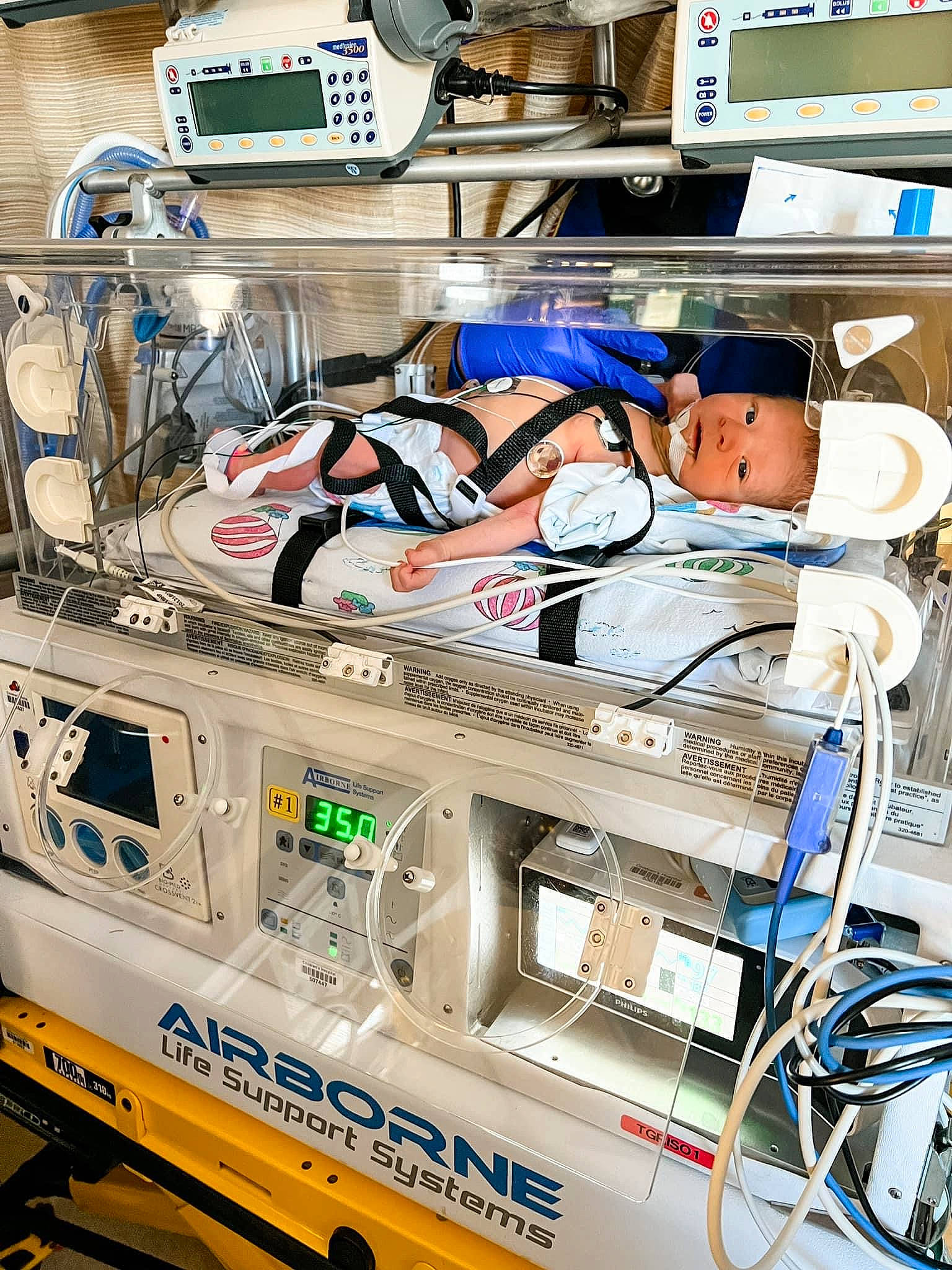 Hayes is registered to the contest to win money with this photo: audio_equipment, automotive_exterior, bag, box, cable, cable_management, computer_hardware, electrical_supply, electrical_wiring, electronic_device, electronic_engineering, electronics, engineering, eyelash, machine, person, personal_protective_equipment, plastic, room, technology