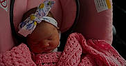 Raylynn is registered to the contest to win money with this photo: baby, baby_accessories, car_seat, child, closeup, comfort, cute, headband, indoors, infant, knitted_blanket, newborn, pacifier, peaceful, pink_blanket, portrait, resting, sleeping, soft_lighting, toddler