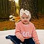 baby, child, girl, bow, headband, sweater, pink, jeans, plate, balloon, number_one, outdoor, tree, pine_needles, blanket, smile, celebration, first_birthday, cute, portrait
