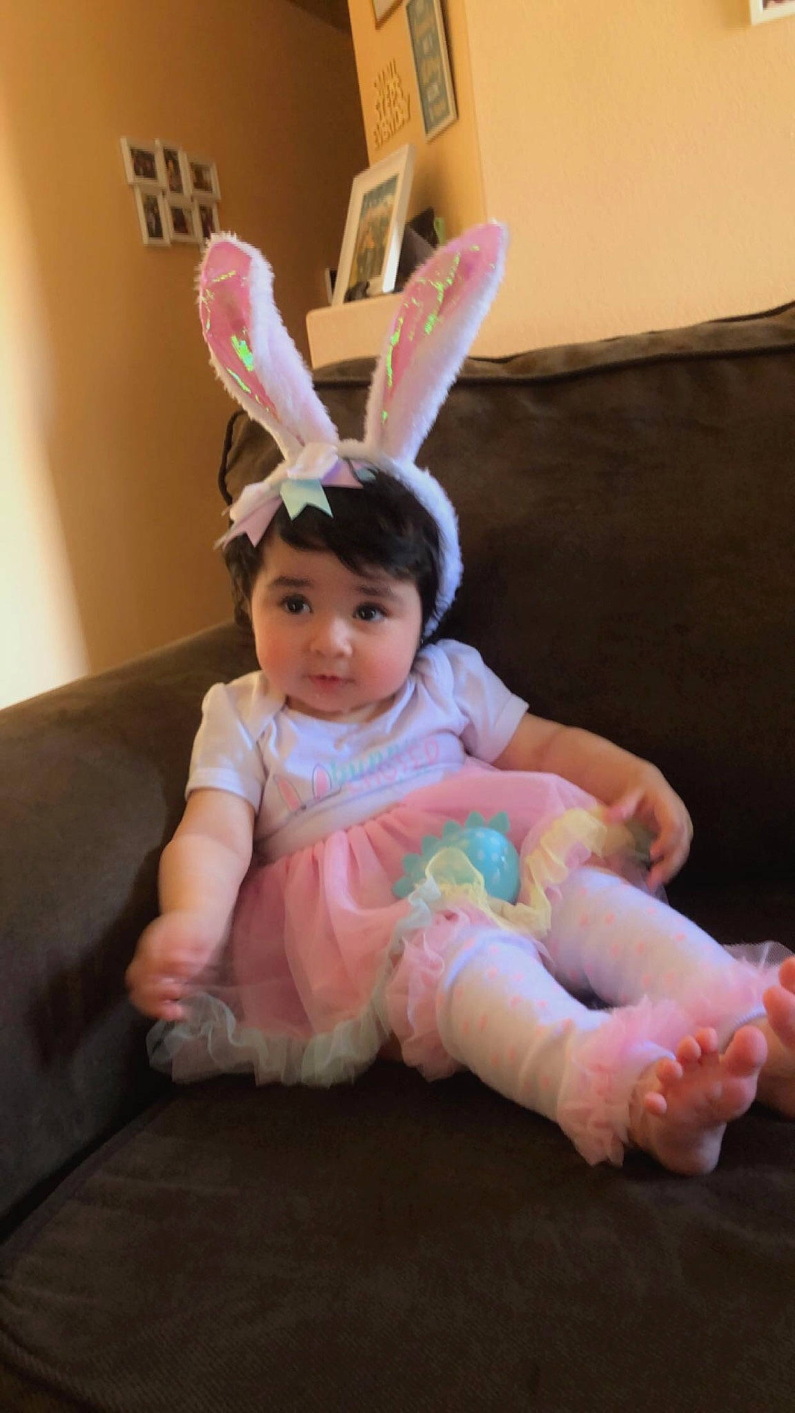 Destiny joined the competition — help win amazing prizes! baby, baby_toddler_clothing, barefoot, child, comfort, couch, ear, event, finger, foot, fun, happy, headband, magenta, person, pink, room, sitting, skin, textile