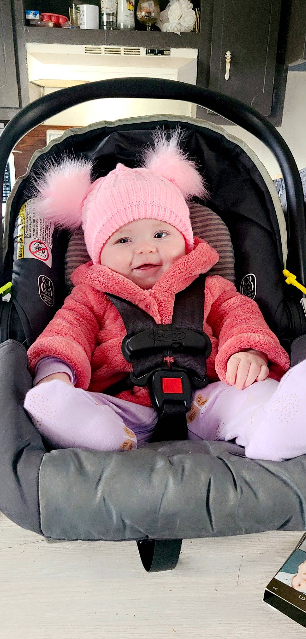 Adalyn is registered to the contest to win money with this photo: auto_part, baby, baby_carriage, baby_products, baby_safety, baby_toddler_clothing, cap, car_seat, car_seat_cover, child, comfort, headwear, lap, luxury_vehicle, motor_vehicle, person, personal_protective_equipment, product, seat_belt, sitting