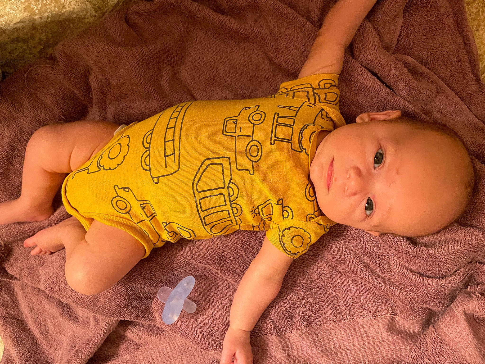 Louis is registered to the contest to win money with this photo: baby, baby_products, baby_sleeping, baby_toddler_clothing, cheek, child, comfort, finger, flooring, foot, human_leg, infant_bodysuit, linens, nose, pattern, person, skin, sleeve, textile, thigh