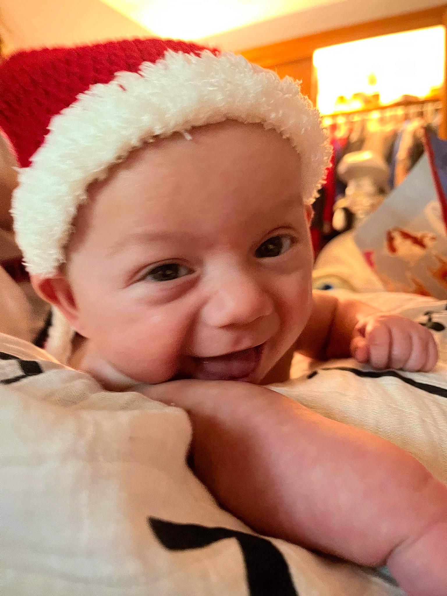 Louis joined the competition — help win amazing prizes! baby, cap, cheek, child, comfort, event, finger, fun, fur, gesture, happy, headwear, holiday, lip, mouth, nose, person, santa_claus, skin, smile
