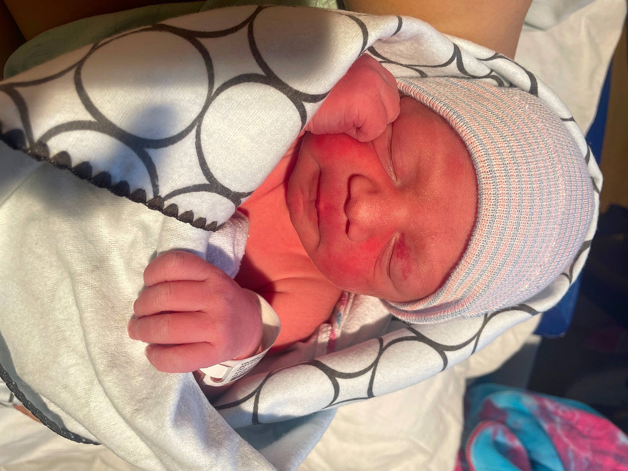 Louis is registered to the contest to win money with this photo: baby, baby_products, baby_sleeping, baby_toddler_clothing, bedtime, cheek, child, comfort, ear, eyelash, facial_expression, finger, headgear, headwear, linens, mouth, nose, person, room, skin