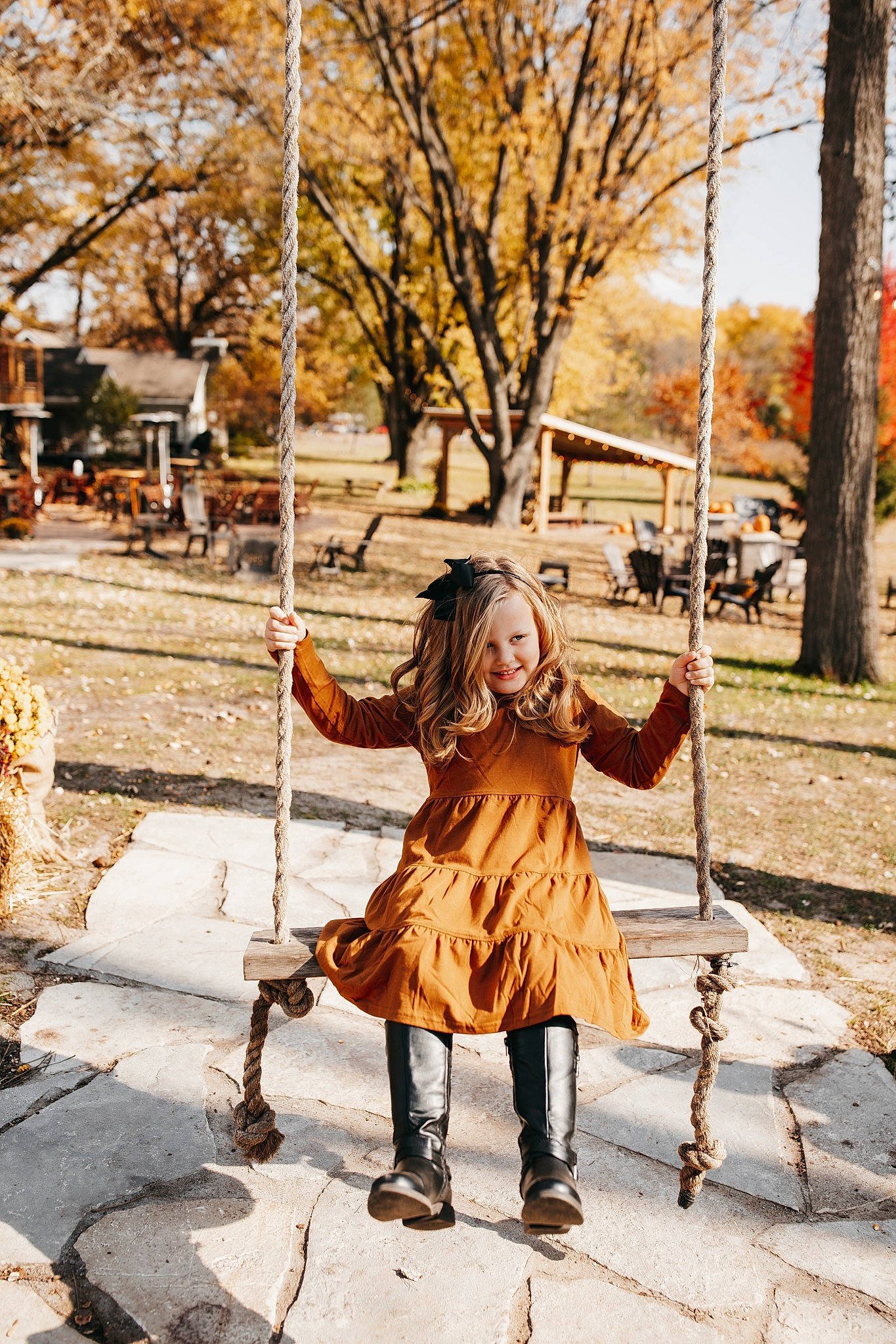 Bailee is registered to the contest to win money with this photo: boot, brown_hair, dress, fawn, grass, happy, human_leg, joy, leaf, leg, leisure, people, people_in_nature, person, plant, sidewalk, tints_and_shades, tree, trunk, waist