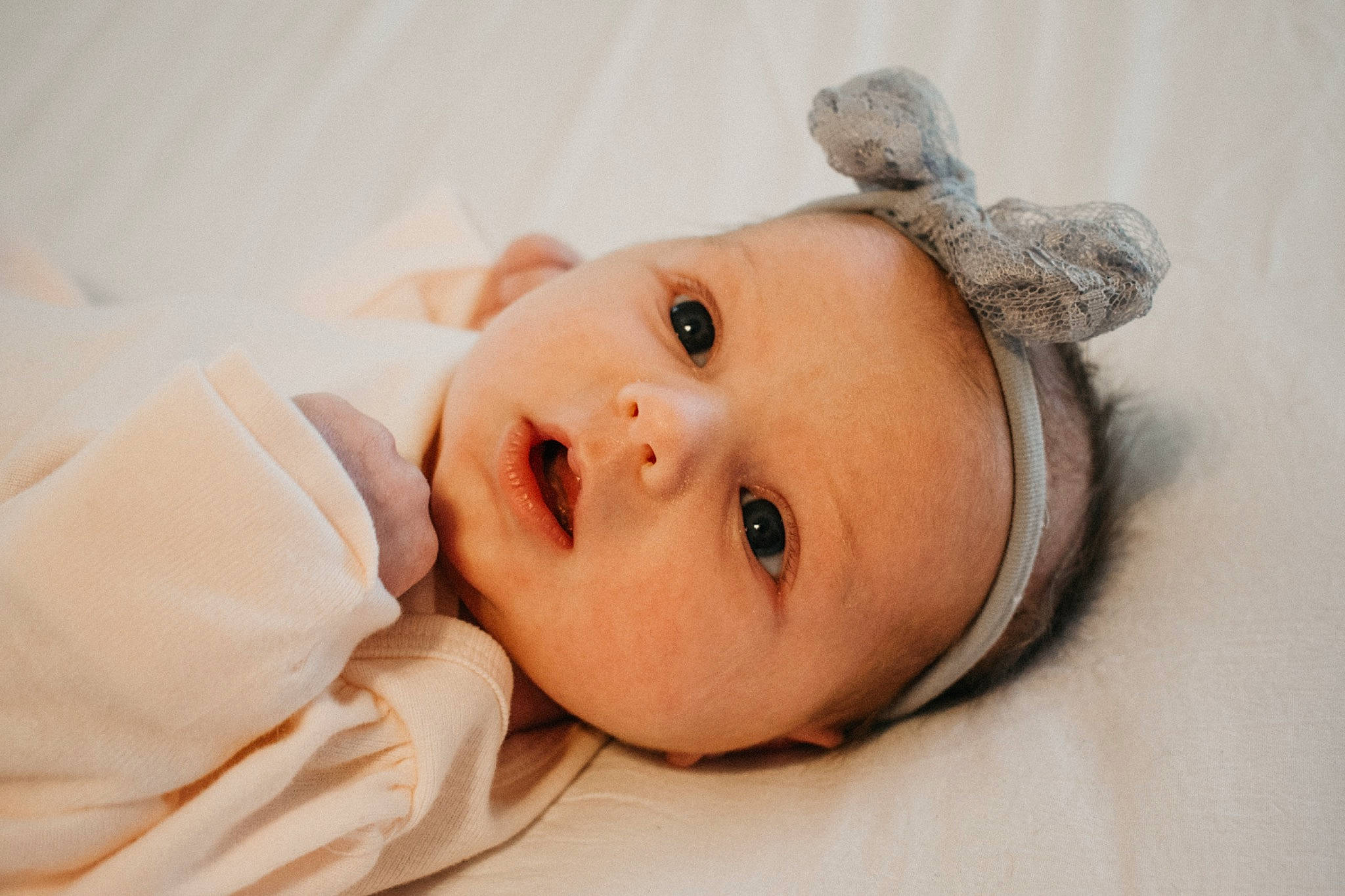 Saylor joined the competition — help win amazing prizes! baby, baby_toddler_clothing, cheek, child, comfort, eyebrow, eyelash, fashion_accessory, fur, happy, hat, headpiece, human_body, iris, linens, lip, no_expression, nose, person, sleeve