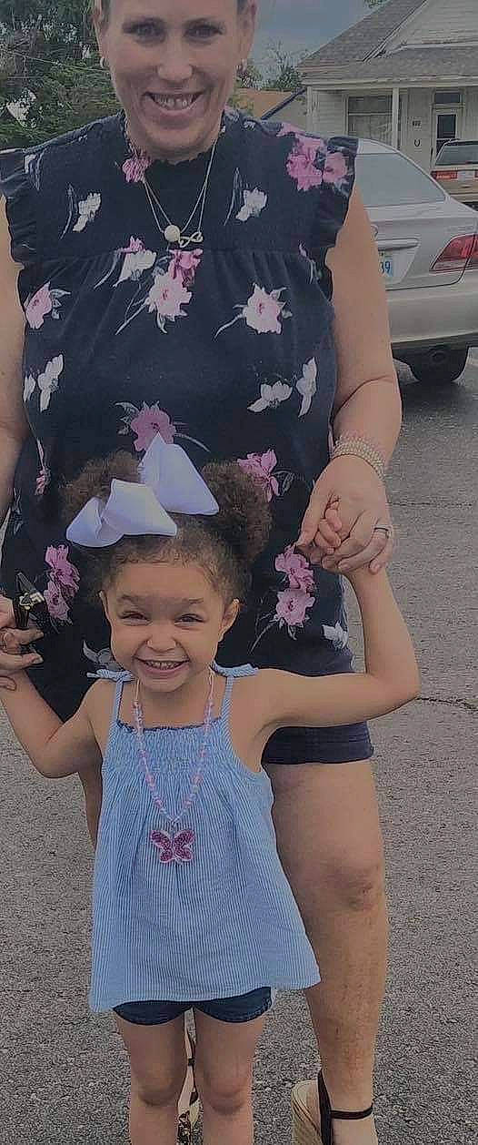 Remedy is registered to the contest to win money with this photo: arm, blurred, fashion, gesture, hairstyle, hand, happy, headgear, headwear, joy, magenta, pattern, person, petal, pink, plant, sleeve, smile, standing, summer