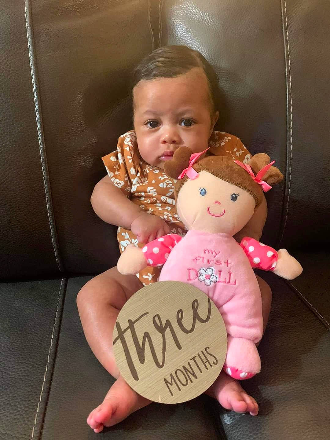 Aylah is registered to the contest to win money with this photo: arm, baby, baby_toddler_clothing, cheek, child, doll, facial_expression, gesture, handwriting, happy, head, person, pink, plush, room, skin, stuffed_toy, textile, thumb, toddler