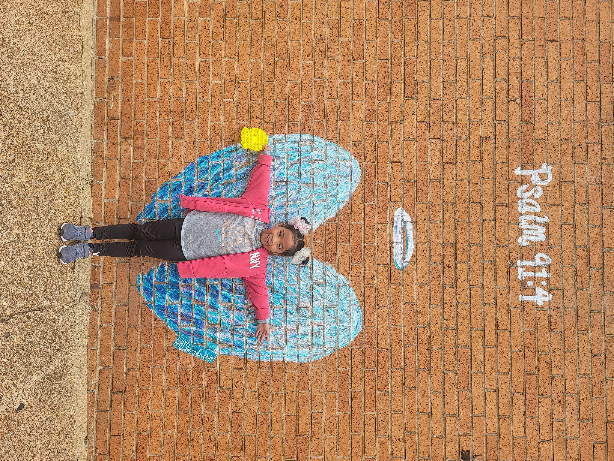 Malina is registered to the contest to win money with this photo: art, brick, brickwork, circle, concrete, electric_blue, facade, fun, hat, human_leg, joy, leisure, pattern, person, recreation, road_surface, sidewalk, street_fashion, sunglasses, visual_arts