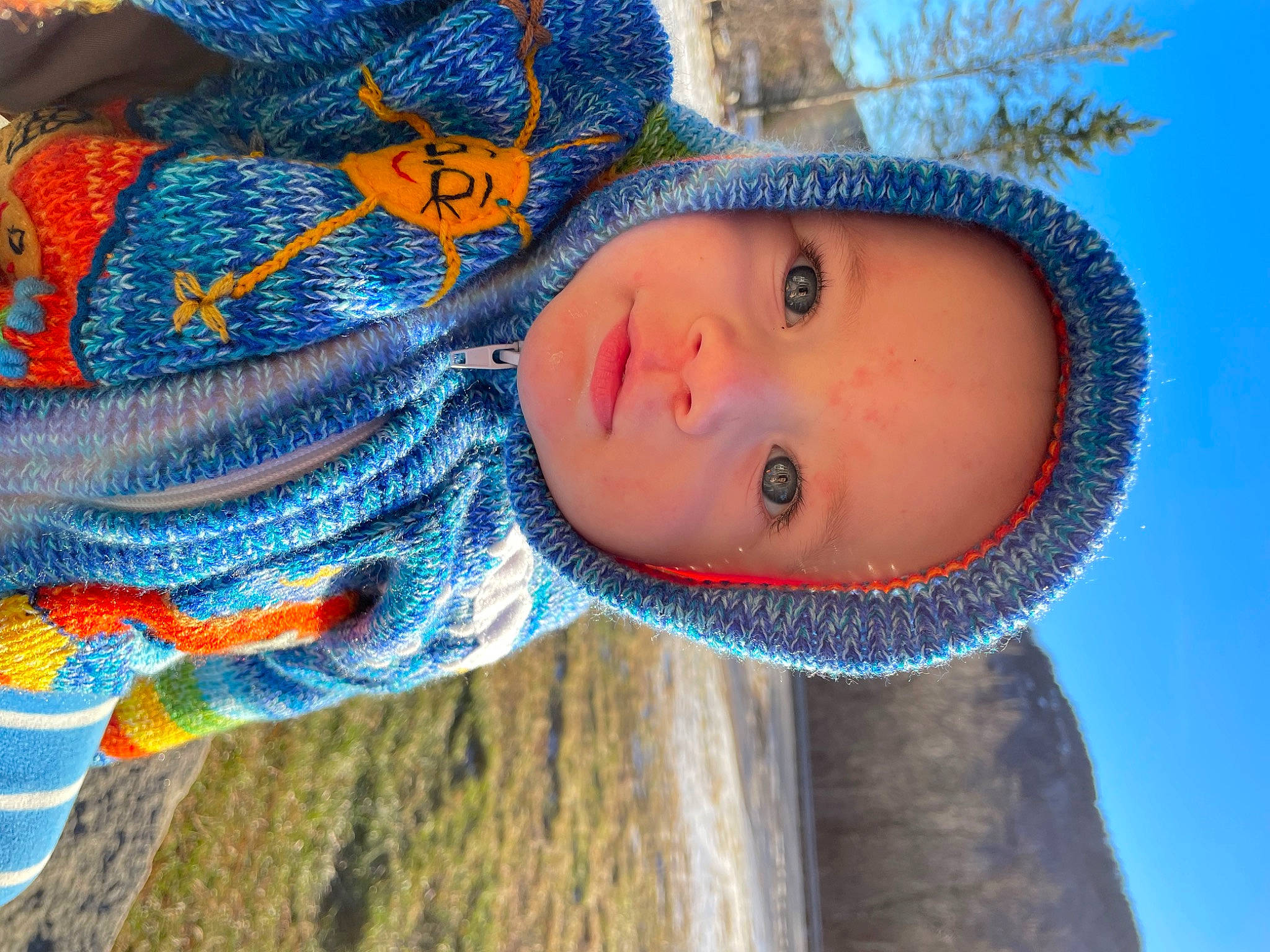 Zeb joined the competition — help win amazing prizes! azure, child, close_up, electric_blue, facial_expression, fun, grass, happy, hat, headwear, iris, leisure, lip, pattern, person, plant, sky, toddler, tree, winter