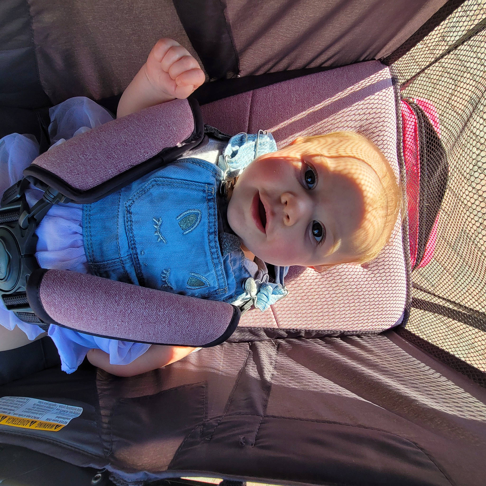 Makenna joined the competition — help win amazing prizes! auto_part, baby, baby_carriage, baby_products, baby_toddler_clothing, child, comfort, electric_blue, fashion_accessory, fun, hat, leisure, pattern, person, sitting, smile, sun_hat, textile, toddler, travel