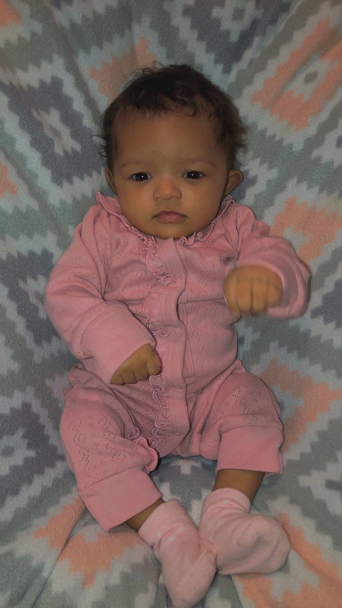 Kaelyn is registered to the contest to win money with this photo: baby, baby_products, baby_toddler_clothing, cheek, child, finger, foot, hand, pattern, peach, person, pink, skin, sock, toddler