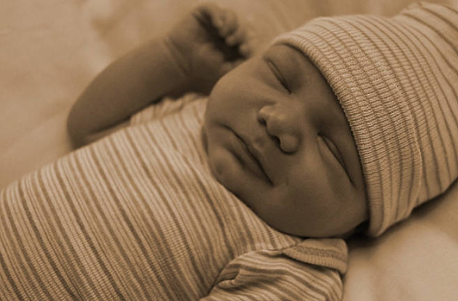 Aiyden is registered to the contest to win money with this photo: baby, baby_sleeping, bedtime, child, comfort, headwear, linens, nap, person, portrait_photography, room, skin, sleep, sleeve, toddler, wood, wool