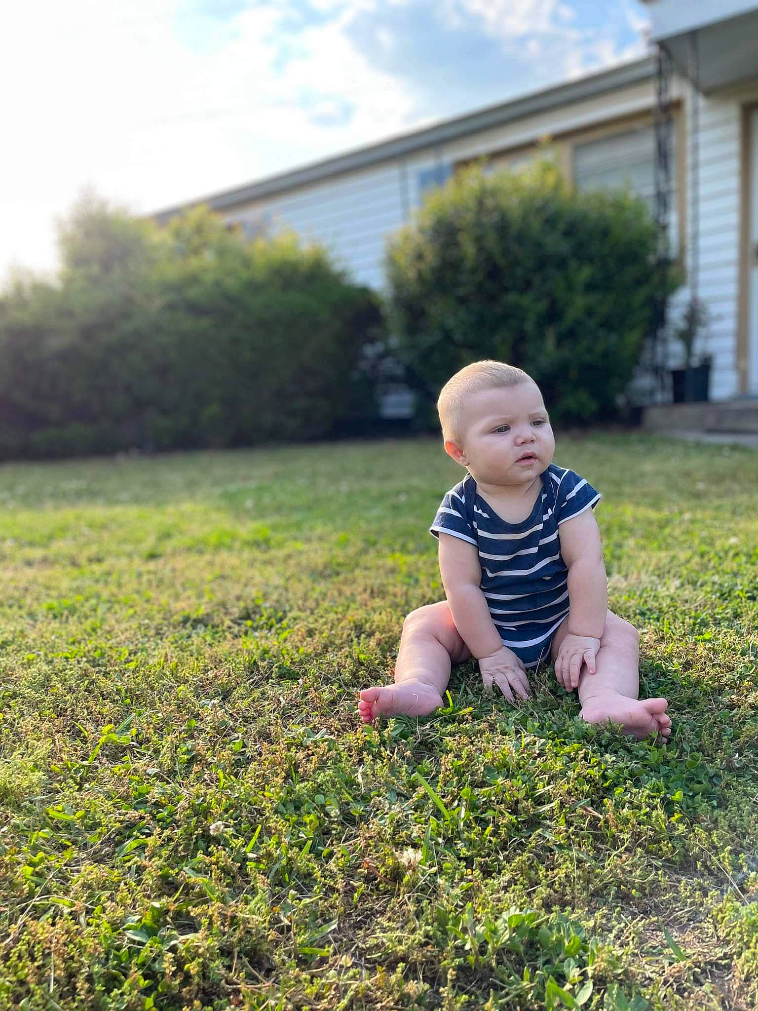 Aiyden is registered to the contest to win money with this photo: baby, baby_toddler_clothing, child, cloud, flash_photography, fun, grass, grassland, groundcover, happy, landscape, lawn, leisure, meadow, people_in_nature, person, plant, sitting, sky, toddler
