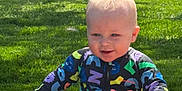 Rowan joined the competition — help win amazing prizes! baby, child, pajamas, bubble, grass, outdoor, sunlight, blanket, play, nature, sitting, colorful, fun, daylight, happy, infant, smile, toy, face, person