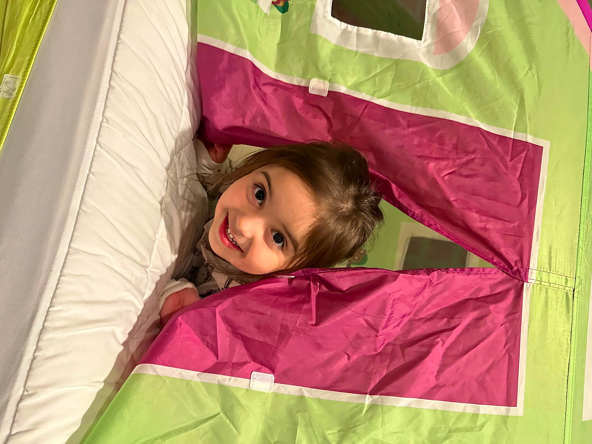 Sara is registered to the contest to win money with this photo: comfort, event, eye, facial_expression, fun, grass, happy, joy, leisure, magenta, people_in_nature, person, pink, product, purple, recreation, red, sleeve, smile, tints_and_shades