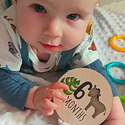 Arlo joined the competition — help win amazing prizes! baby, infant, milestone, 6_months, blanket, toy, colorful, face, eyes, hand, cute, child, lying, indoor, soft, clothing, zebra, leaf, play, curious