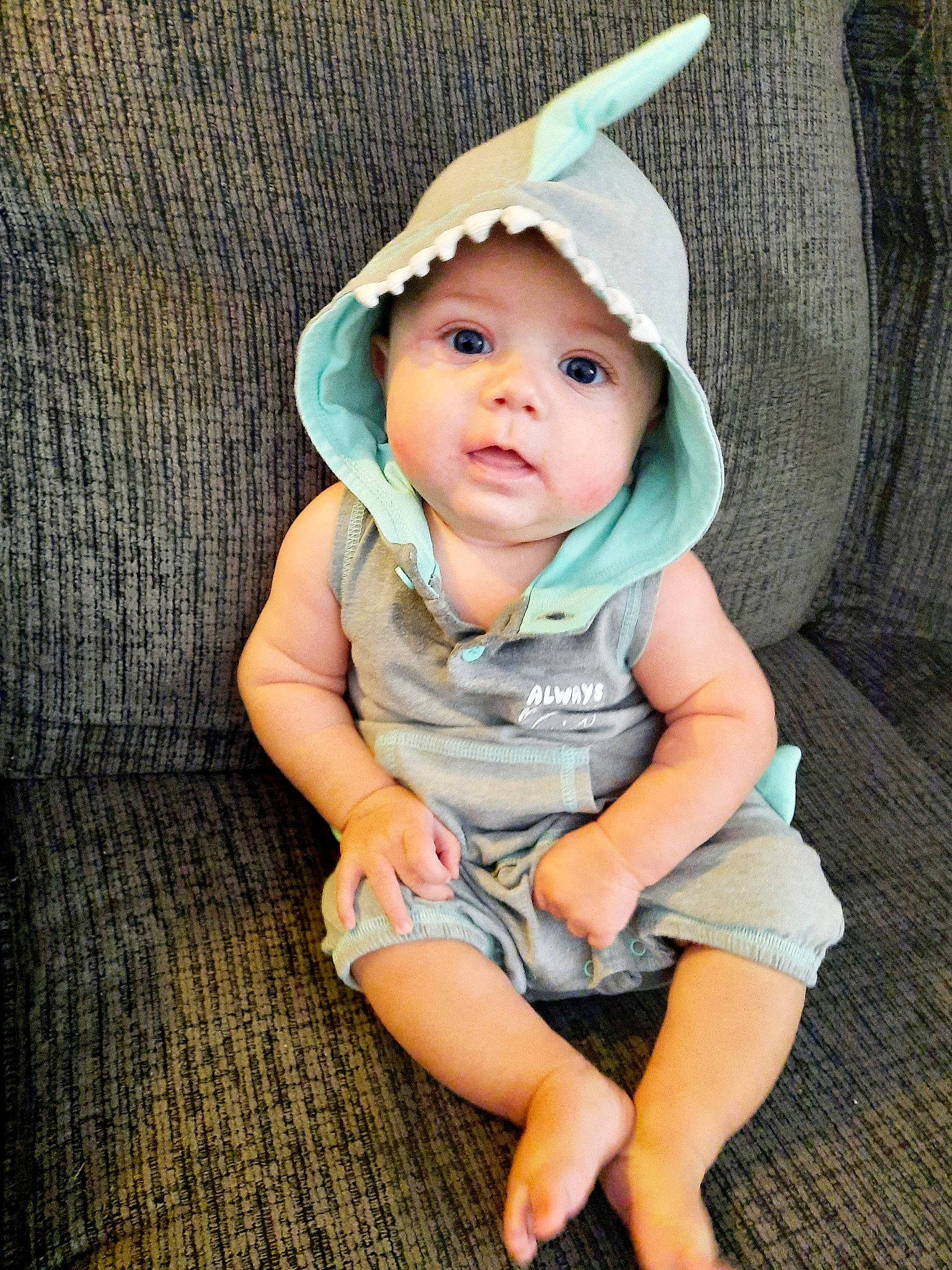 Boden joined the competition — help win amazing prizes! baby, baby_products, baby_toddler_clothing, cap, cheek, child, eye, face, fashion_accessory, fun, grass, happy, head, headwear, knit_cap, pattern, person, skin, sleeve, t_shirt