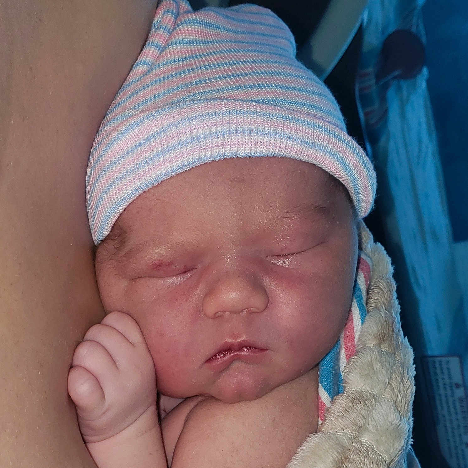 Isabella joined the competition — help win amazing prizes! baby, beanie, bonnet, cap, clothing, face, glove, hat, head, newborn, person, photography, portrait, sleeping