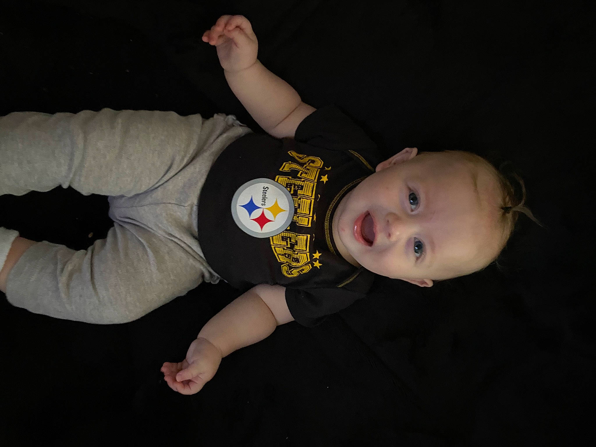 Oaklynn joined the competition — help win amazing prizes! baby, baby_products, baby_toddler_clothing, cheek, child, comfort, couch, darkness, elbow, flash_photography, fun, human_body, person, personal_protective_equipment, sitting, sleeve, smile, t_shirt, toddler