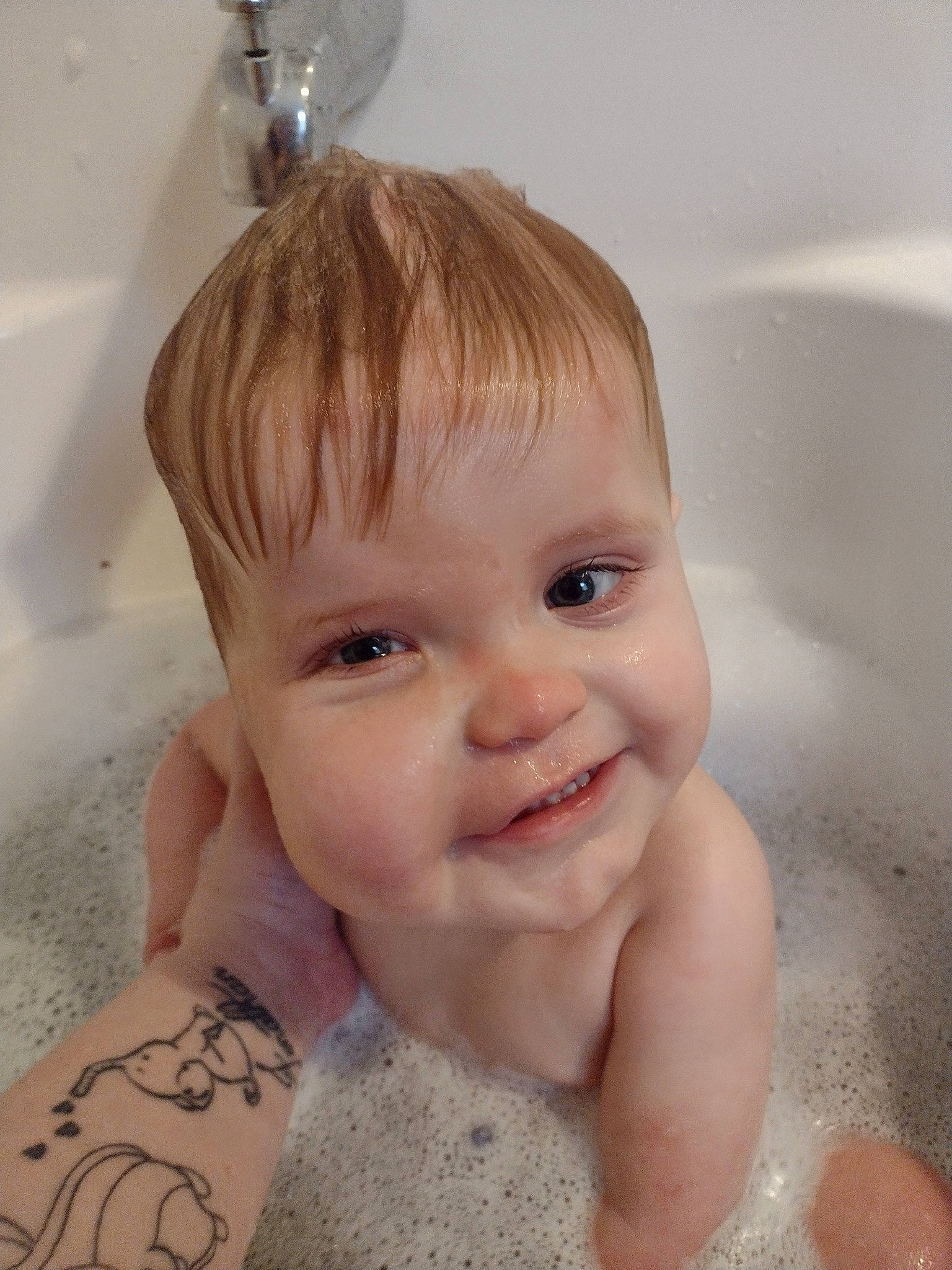 Thurman joined the competition — help win amazing prizes! baby_bathing, bathing, bathroom, bathtub, beauty, chest, eye, fluid, gesture, hand, happy, person, plumbing, plumbing_fixture, skin, sleeve, smile, temporary_tattoo, toddler, water