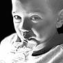 background, beverage, black_and_white, child, close_up, clothing, drink_pouch, expression, eyes, face, focus, hand, monochrome, mouth, person, portrait, skin, soft_light, texture, young_child
