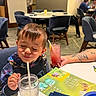 Elijah joined the competition — help win amazing prizes! beverage, boy, casual, chair, child, clothing, dining, drink, family, food, hair, happy, indoor, menu, person, restaurant, smile, straw, table, tattoo