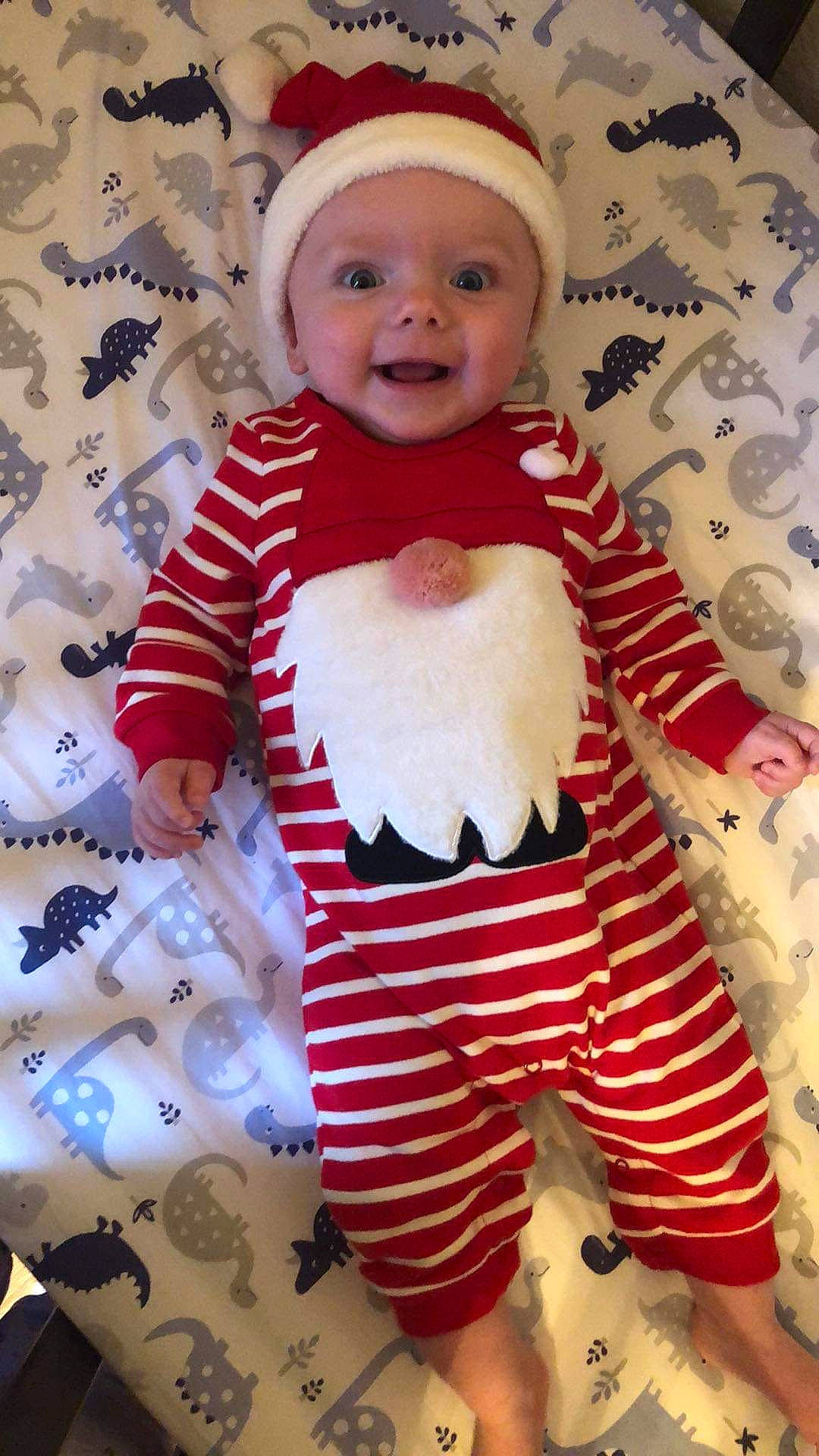 Nathaniel joined the competition — help win amazing prizes! baby, baby_toddler_clothing, cheek, child, costume_hat, event, fictional_character, happy, headwear, holiday, linens, pattern, people, person, pink, red, sleeve, smile, t_shirt, textile