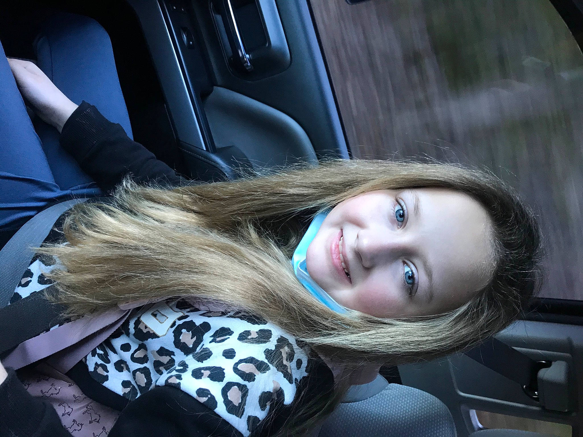 Rayne is registered to the contest to win money with this photo: auto_part, automotive_design, automotive_exterior, beauty, black_hair, blond, car, comfort, cool, electric_blue, flash_photography, fun, joy, lip, long_hair, motor_vehicle, mouth, person, personal_luxury_car, smile