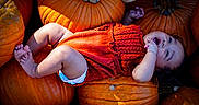 Malahney is registered to the contest to win money with this photo: autumn, baby, celebration, child, cute, diaper, fall, festive, happy, harvest, holiday, infant, knitwear, nature, orange, outdoor, portrait, pumpkin, seasonal, smiling
