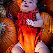 Malahney joined the competition — help win amazing prizes! baby, infant, pumpkin, orange, smiling, cute, knitwear, fall, autumn, harvest, seasonal, outdoor, child, person, happy, skin, legs, feet, portrait, holiday