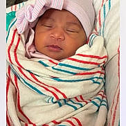 Azaylia joined the competition — help win amazing prizes! newborn, baby, sleeping, infant, portrait, face, pink_hat, bow, swaddled, blanket, striped_blanket, crib, pillow, indoor, nursery, peaceful, eyes_closed, head, screenshot, smartphone_interface