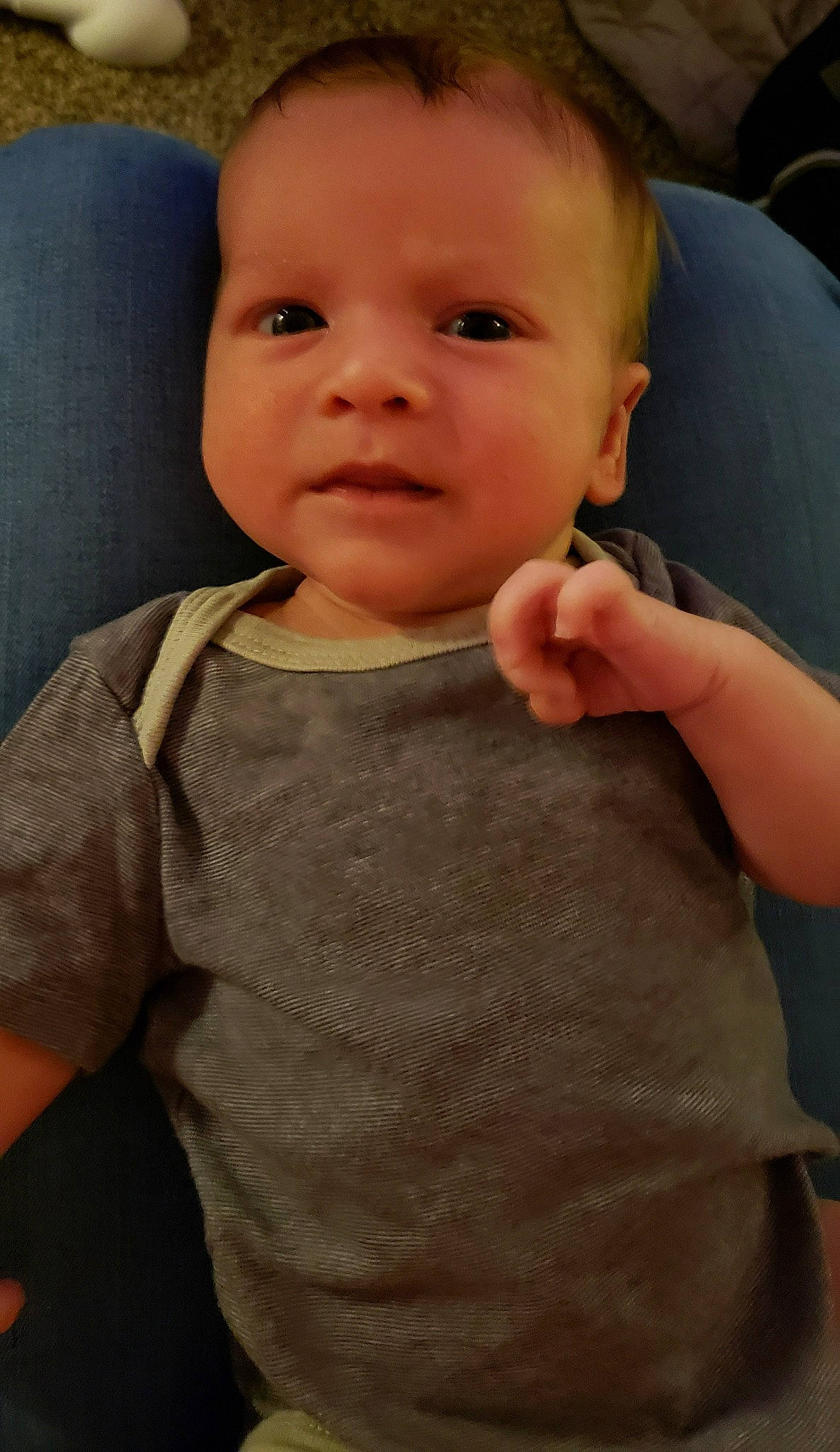 Axl is registered to the contest to win money with this photo: baby, baby_toddler_clothing, cheek, chin, eye, eyebrow, eyelash, finger, gesture, hand, iris, joint, lip, mouth, neck, nose, person, shoulder, skin, sleeve