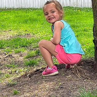 Avah is registered to the contest to win money with this photo: baby_toddler_clothing, child, face, grass, grass_family, hair, hairstyle, happy, head, joy, lawn, leg, leisure, people_in_nature, person, plant, recreation, shoe, smile, sneakers