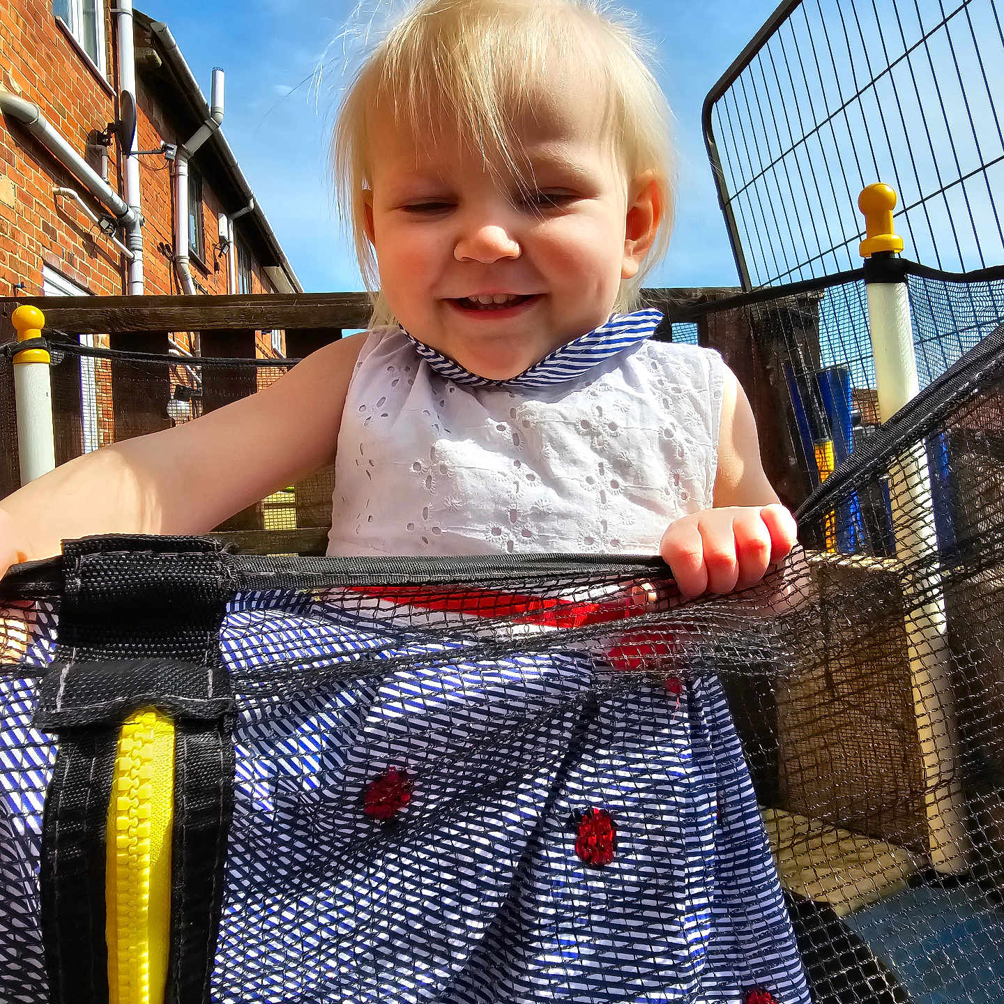 Matilda-Rose joined the competition — help win amazing prizes! baby, bag, bodypart, city, clothing, dress, face, fence, finger, hand, handrail, head, outdoorplayarea, outdoors, pants, person, photography, playarea, portrait, railing