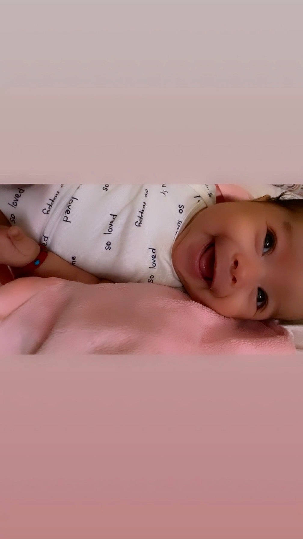 Aolani is registered to the contest to win money with this photo: arm, baby, baby_toddler_clothing, comfort, elbow, eyelash, fashion_accessory, finger, font, hand, headwear, human_body, human_leg, jewellery, joy, linens, nail, neck, person, skin