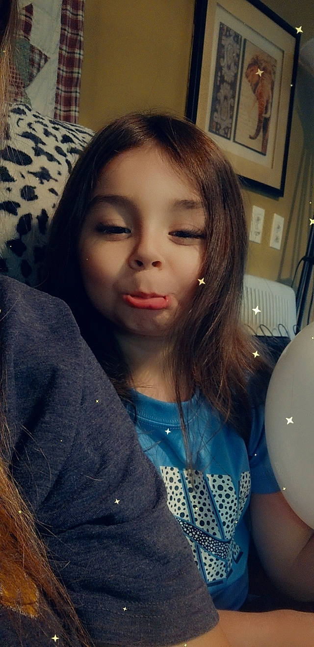 Riley is registered to the contest to win money with this photo: bangs, black_hair, cheek, chin, cool, ear, eyebrow, eyelash, facial_expression, forehead, hair, happy, iris, jaw, lip, long_hair, neck, nose, person, skin