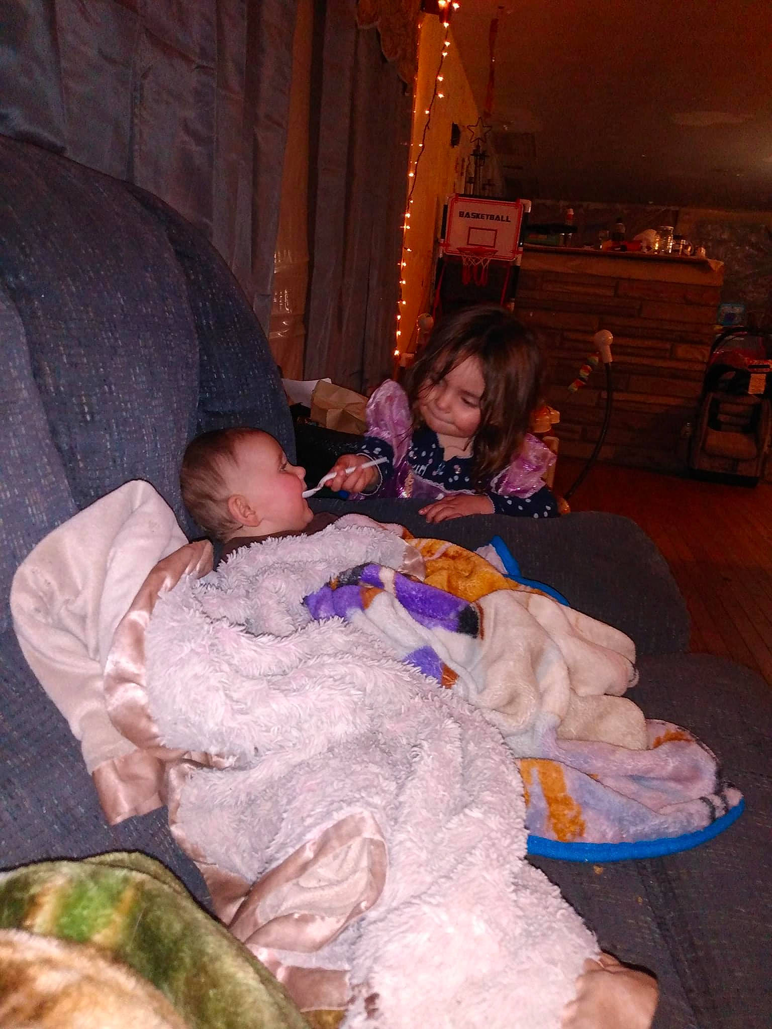 Maddison joined the competition — help win amazing prizes! baby, child, comfort, couch, curtain, event, fun, happy, lap, person, room, sharing, sitting, smile, toddler, tradition, vacation