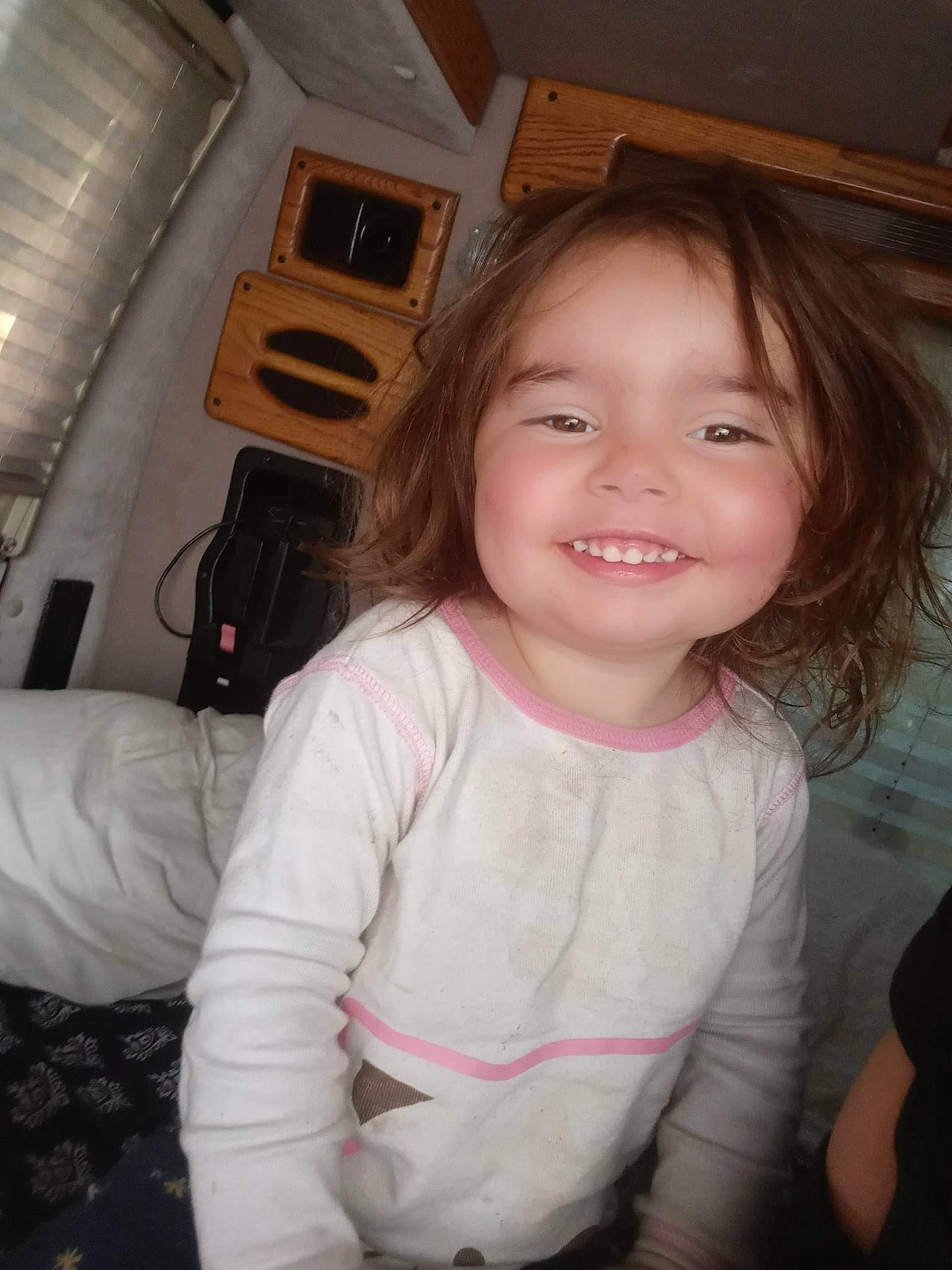 Maddison is registered to the contest to win money with this photo: aircraft_cabin, baby_toddler_clothing, beauty, cheek, chin, comfort, cool, flash_photography, fun, happy, iris, joy, long_hair, mouth, neck, nose, person, shoulder, skin, sleeve