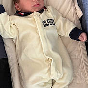 Aren joined the competition — help win amazing prizes! baby, infant, onesie, clothing, blanket, soft, cute, relaxed, sleepwear, child, portrait, indoors, comfortable, young, newborn, cozy, face, hands, socks, resting