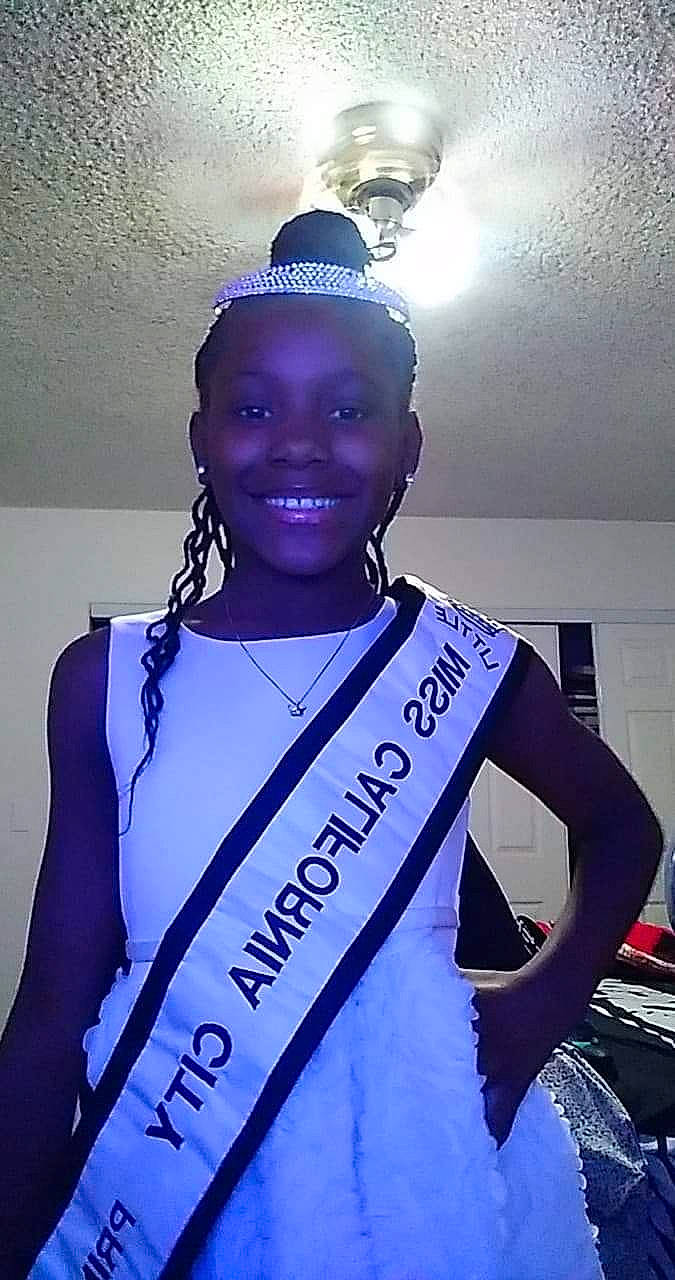 Candace joined the competition — help win amazing prizes! cool, electric_blue, event, fashion_accessory, fashion_design, formal_wear, happy, jersey, jewellery, joy, lighting, magenta, necklace, person, purple, sleeve, smile, sportswear, t_shirt, trunk