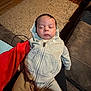Kilynn is registered to the contest to win money with this photo: baby, sleeping, hoodie, clothing, person, indoor, carpet, couch, lap, comfort, cozy, child, young, relaxing, casual, home, soft, peaceful, resting, infant