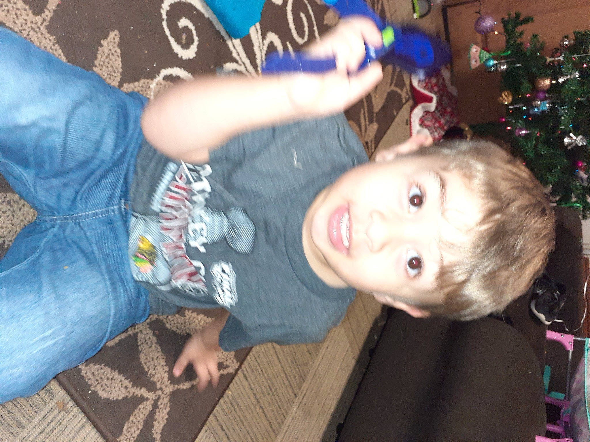 Nikolas is registered to the contest to win money with this photo: bracelet, christmas, christmas_decoration, christmas_eve, christmas_lights, christmas_ornament, christmas_tree, conifer, cool, denim, fir, holiday, holiday_ornament, interior_design, ornament, person, pine, pine_family, throat